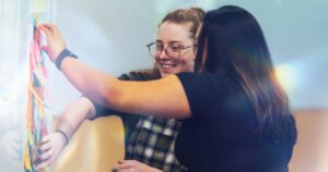 Our Services - Facilitation Workshops - Creative in Residence - Time well spent - two people collaborating